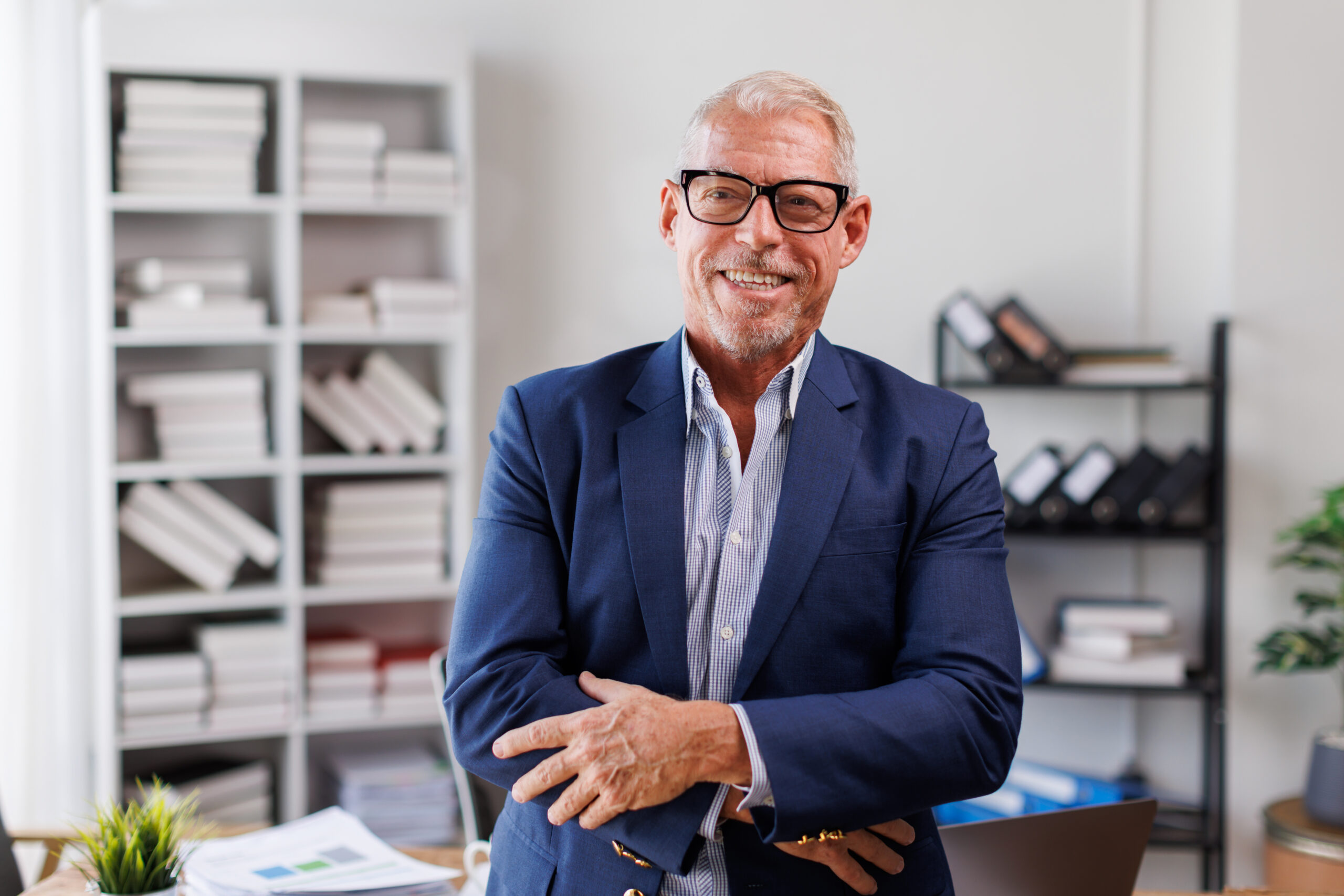 confident businessman in office with shelves behin 2026 01 08 05 53 22 utc